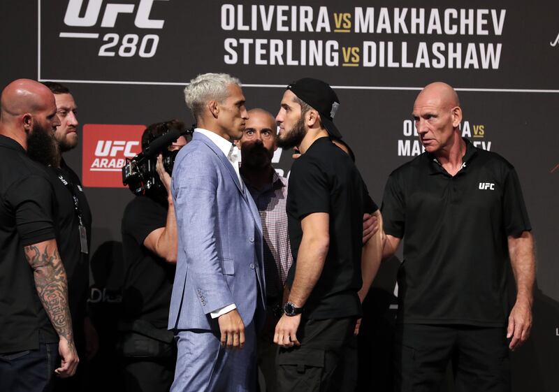 Charles Oliveira, left, and Islam Makhachev face off at the press conference ahead of their lightweight title fight at UFC 280 in Abu Dhabi. All images by Chris Whiteoak / The National