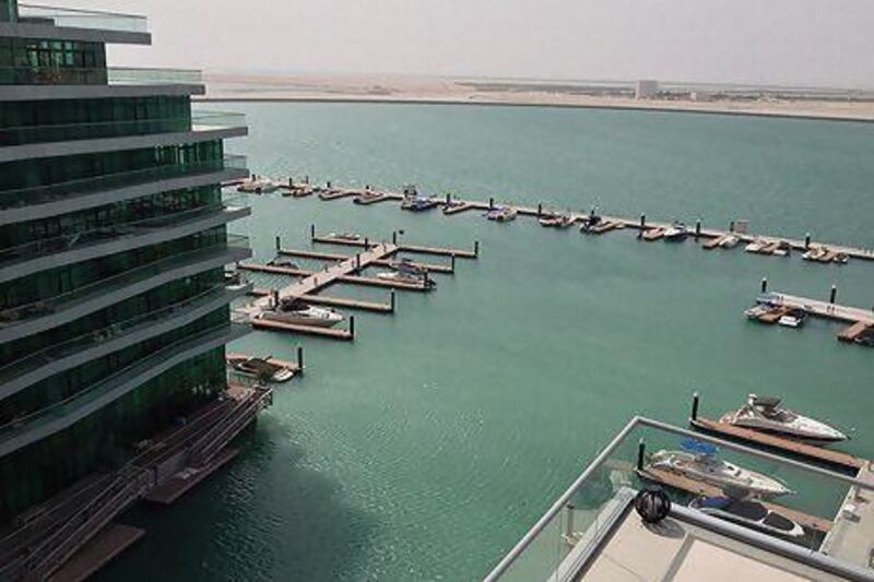 A three-bedroom apartment in Al Bandar with sea views and spacious outdoor areas. Courtesy of Rex Real Estate