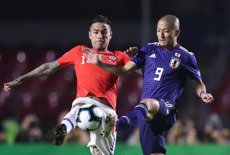 Japan's Daizen Maeda in action with Chile's Erick Pulgar. Reuters
