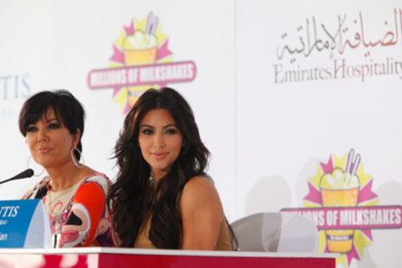 Kim Kardashian, right, and her mother Kris Jenner at a Millions of Milkshakes press conference at Atlantis last weekend.