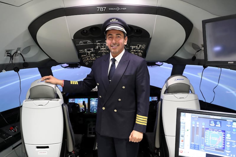 ABU DHABI , UNITED ARAB EMIRATES , February 27 – 2019 :- Captain Abdulla Obaid, Emirati pilot who flew the Pope home at the Etihad Boeing 787 flight simulator at Etihad HQ near the airport in Abu Dhabi. ( Pawan Singh / The National ) For POAN. Story by Gillian
