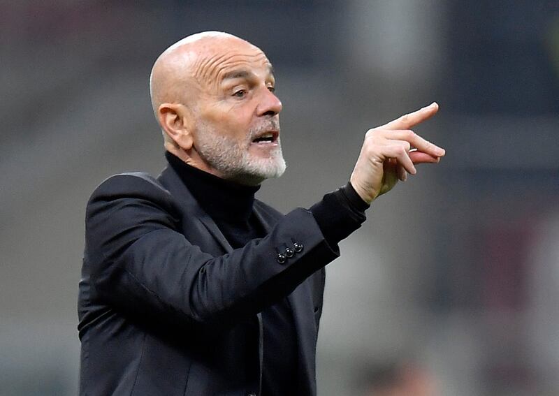 AC Milan coach Stefano Pioli gives instructions. Reuters