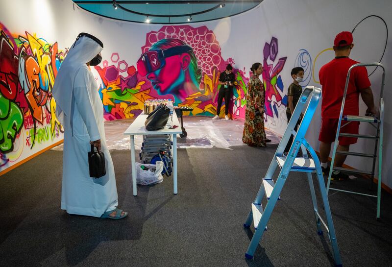 A workshop on graffiti art at World Conference on Creative Economy 2021, Dubai. Victor Besa / The National