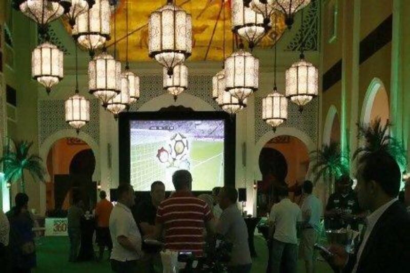 Euro Cup fans gather at the Ibn Battuta Gate Hotel to watch the opening match of the 2012 season.