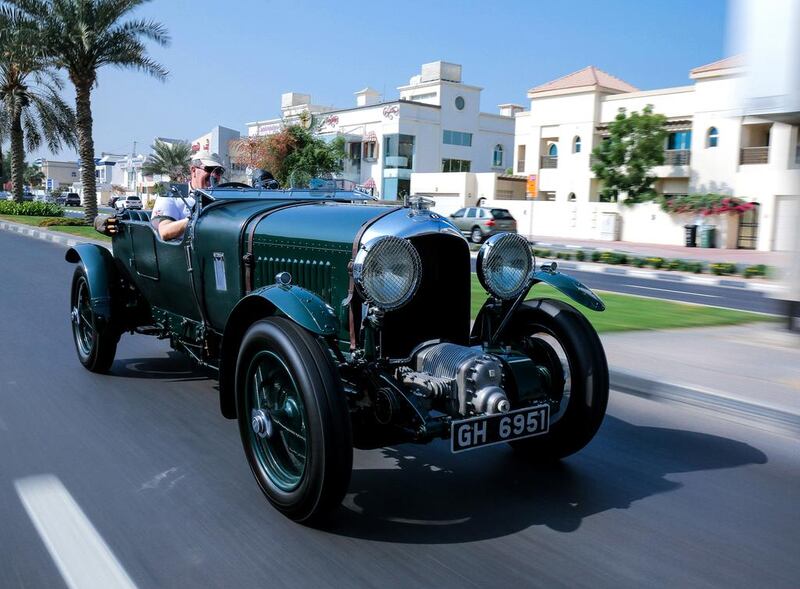 Bentley’s 4 1/2 Litre supercharged Blower, driven by brand ambassador Richard Charlesworth, on the streets of Dubai. Victor Besa for The National