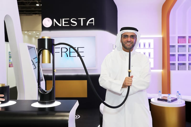 Mohammed Al Mazrouei, chief executive of Medad Holding, at the company's stand during the World Vape show in Dubai. All photos: Pawan Singh / The National