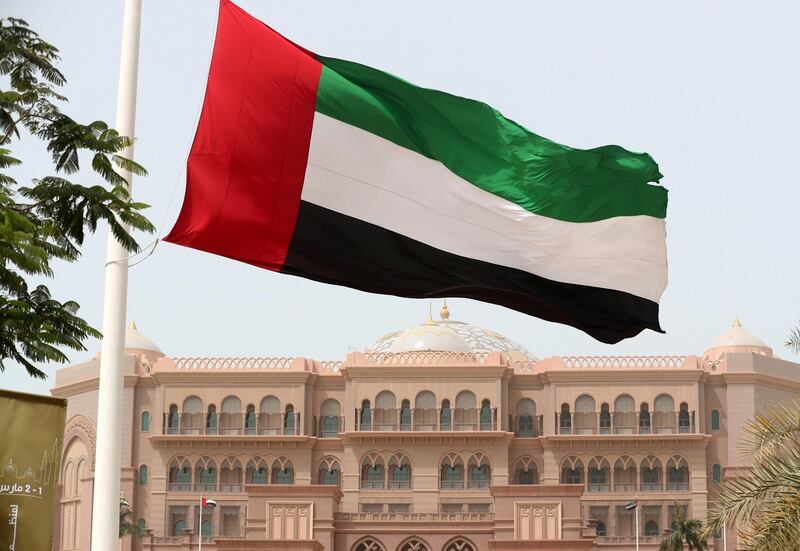 Abu Dhabi, United Arab Emirates - March 01, 2019: The UAE flag is replaced by a new one as the wind blows strong in Abu Dhabi. Friday the 1st of March 2019 at Emirates Palace, Abu Dhabi. Chris Whiteoak / The National