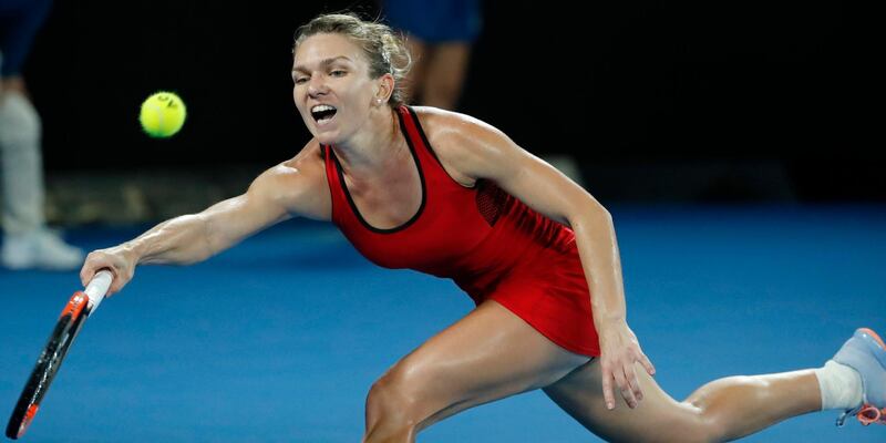 epa06477917 Simona Halep of Romania in action during her women's singles final match against Caroline Wozniacki of Denmark at the Australian Open Grand Slam tennis tournament in Melbourne, Australia, 27 January 2018.  EPA/MAST IRHAM