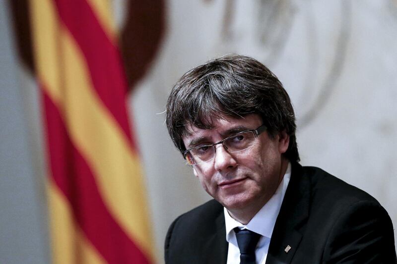 (FILES) This file photo taken on October 10, 2017 shows Catalan regional government president Carles Puigdemont attending a regional government meeting at the Generalitat Palace in Barcelona.
The victory of the separatist camp and parallel success of an anti-secession party in Catalan elections highlights the region's stark division and leaves it exposed to huge political and economic uncertainty, analysts say. / AFP PHOTO / PAU BARRENA