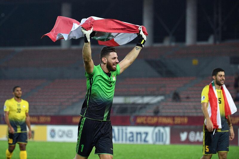 Al Ahed's goalkeeper Mehdi Kahlil and teammates celebrate winning the AFC Cup Final with a 1-0 victory over North Korea's April 25 Sports Club. AFP