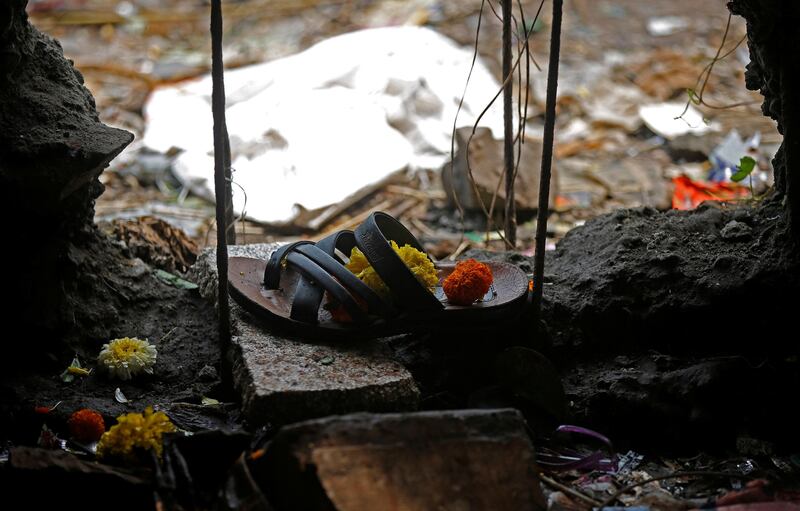 A sandal of one of the victims of a stampede is seen below a railway station's pedestrian overbridge in Mumbai, India. Shailesh Andrade / Reuters