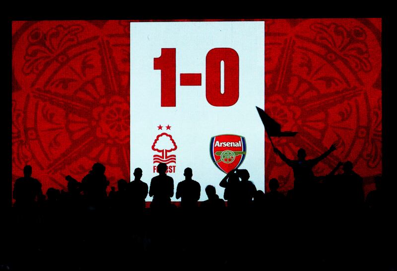 The LED score board at the City Ground shows the full-time score. Getty Images