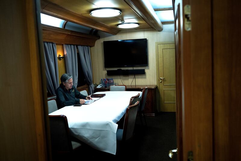 US Secretary of State Antony Blinken works while traveling by train to Kyiv, Ukraine. AP