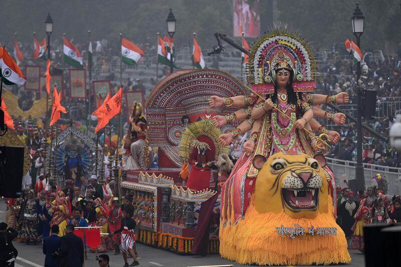 Perfprmers dance as the Ministry of culture tableaux takes part in India’s 74th Republic Day parade in New Delhi on January 26, 2023.  (Photo by Money SHARMA  /  AFP)