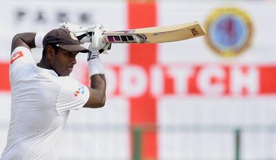 Sri Lanka's Angelo Mathews plays during the fourth day of the second Test match between Sri Lanka and England at the Pallekele International Cricket Stadium in Kandy on November 17, 2018. / AFP / ISHARA S. KODIKARA
