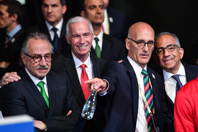 President of the Mexican Football Association Decio de Maria Serrano, left, Steve Reed, second left, president of the Canadian Soccer Association, Carlos Cordeiro, right, President of the United States Football Association, attend the 68th FIFA Congress at the Expocentre in Moscow, Russia, on June 13, 2018.  Mladen Antonov / AFP