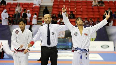 Omar Al Fadhli, pictured right, won a silver medal in the Asian Games.    