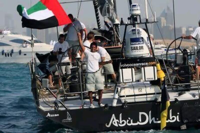 Adil Khalid, an Emirati crew member of Abu Dhabi Ocean Racing Team, greets supporters in the capital.