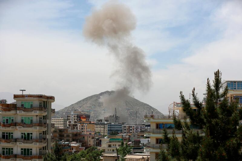 Smokes rises in the distance after the explosion. AP