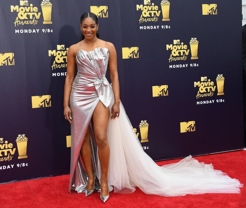 HIT
Tiffany Haddish in Galia Lahav. As the host of the event, it is only fair that Haddish got to wear something fabulous, and she looked like a vision in this Lahav shimmering silver lamé number. Cut into a wildly dramatic slash around her legs, the side train of white net stopped it looking too 1970s. The best bit? Because lamé is so unforgiving, it was clever to put pleats and folds into the fabric to keep it chic and not clingy