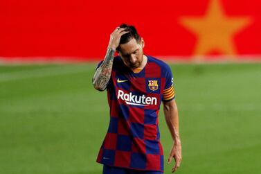 Barcelona's Lionel Messi looks dejected. Reuters