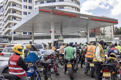 Drivers and motorcyclists queue for fuel at a gas station in Nairobi, Kenya. Bloomberg