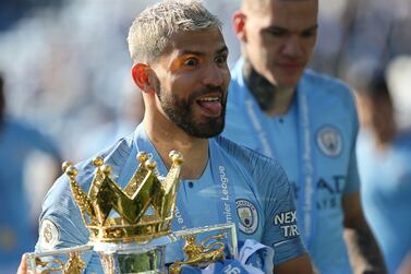 (FILE) - Manchester City's Sergio Aguero celebrates with the Premier League trophy after the English Premier League soccer match between Brighton and Hove Albion and Manchester City in Brighton, Britain, 12 May 2019 (re-issued on 15 December 2021).  Argentinian striker Sergio 'Kun' Aguero announced his retirement during a press conference in Barcelona, Spain, on 15 December 2021.   EPA/JAMES BOARDMAN EDITORIAL USE ONLY.   No use with unauthorized audio, video, data, fixture lists, club/league logos or 'live' services.  Online in-match use limited to 120 images, no video emulation.  No use in betting, games or single club/league/player publications.  *** Local Caption *** 55203430