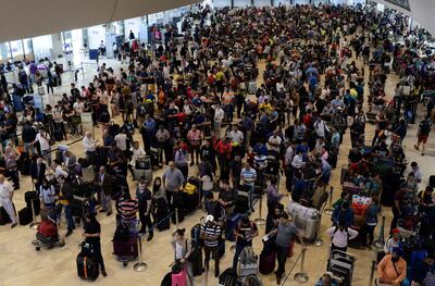 Stranded passengers wait at Terminal 1 for their flights to resume after Xiamen Airlines Boeing 737-800 Flight MF8667 overshot the runway upon landing at Ninoy Aquino International airport in Paranaque, Metro Manila in Philippines, August 17, 2018. REUTERS/Eloisa Lopez