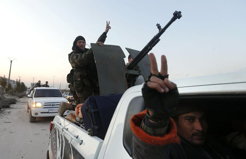 A picture taken during a guided tour organised by the Syrian army shows regime forces in the area of al-Lirmoun, north of Aleppo.  AFP