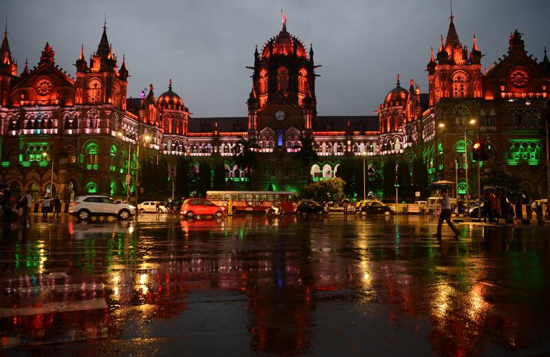 The Chattrapathi Shivaji Terminus railway station is lit up the colours of India in Mumbai. Punit Paranjpe / AFP Photo
