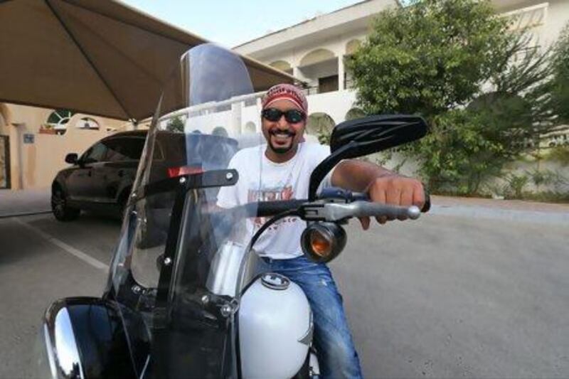 Ali Kaddas with his motorcycle in Abu Dhabi. Ravindranath K / The National