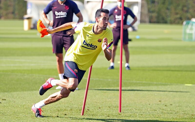 Sergio Busquets sprints during a training session at Ciutat Esportiva Joan Gamper. Getty Images