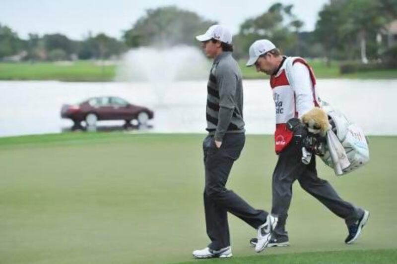 Rory McIlroy first blamed his walk off at the Honda Classic last week on mental fatigue, then a wisdom tooth. Stuart Franklin / AFP