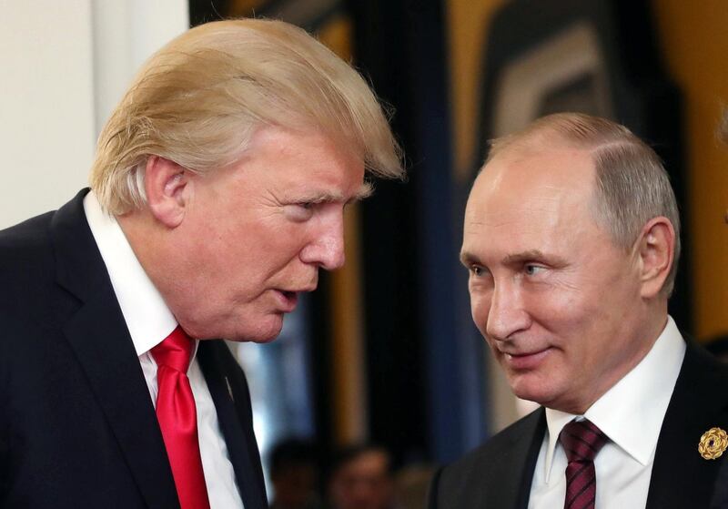 epa06885713 (FILE) - Russian President Vladimir Putin (R) and US President Donald J. Trump (L) talk during a break of a leader's meeting at the 25th Asia-Pacific Economic Cooperation (APEC) summit in Da Nang, Vietnam, 11 November 2017 (reissued 13 July 2018). US President Donald J. Trump and Russian President Putin will meet in Helsinki, Finland on 16 July 2018.  EPA/MIKHAIL KLIMENTYEV/SPUTNIK/KREML MANDATORY CREDIT *** Local Caption *** 53952090