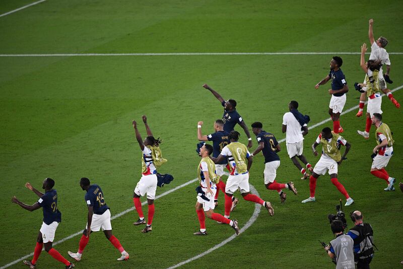 France players celebrate their victory over Denmark in Group D. AFP