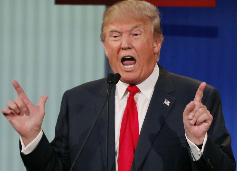 Donald Trump answers a question at the first official Republican presidential candidates debate in Cleveland, Ohio. Brian Snyder / Reuters 