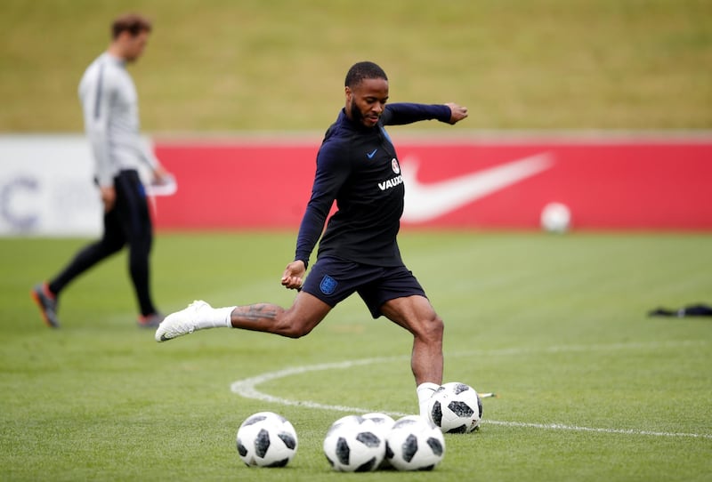 Raheem Sterling takes a shot at goal during a training session at St Georges Park on May 28, 2018 in Burton-upon-Trent, England. Carl Recine / Reuters