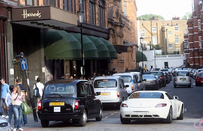 LONDON. 16th August 2010. A high performance supercar flown in from Saudi Arabia  drives by  the Harrods department store in  Knightsbridge, London. Stephen Lock  for The National   FOR FOREIGN. NOTE: PIXILATE NUMBERS ON LICENCE  PLATE 