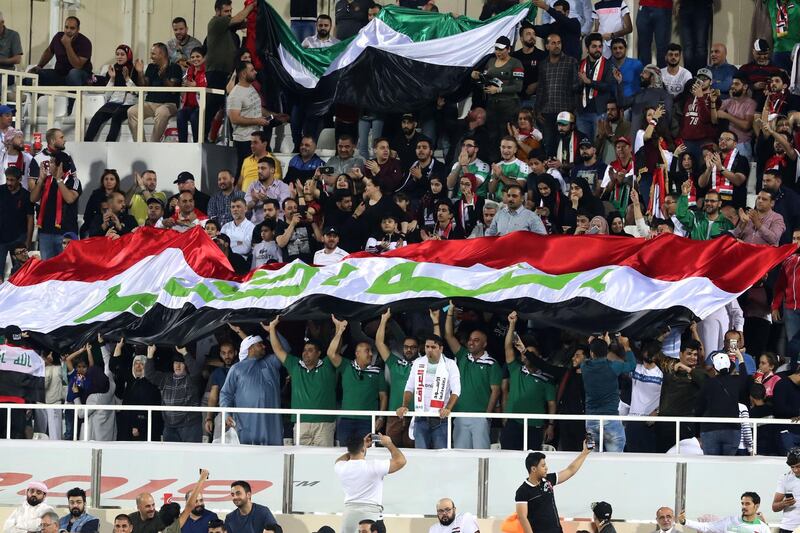Iraqi supporters cheer during the 2019 AFC Asian Cup Group D match at Sharjah Stadium. AFP
