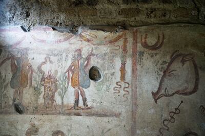 A fresco found inside the kitchen of a house at the Pompeii archaeological site. AP Photo