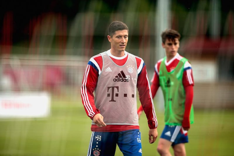 Robert Lewandowski, left, and Lucas Scholl of Bayern Munich attend Wednesday's team training session. Johannes Simon / Bongarts / Getty Images