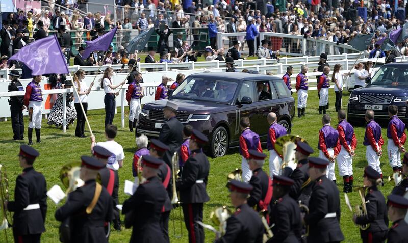 Members of the royal family are greeted by jockeys past and present on Derby Day during the Cazoo Derby Festival at Epsom Downs Racecourse. PA wire