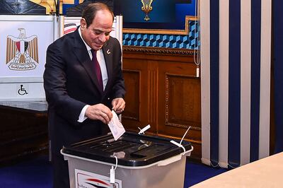 Egyptian President Abdel Fattah El Sisi casts his vote in the presidential election in Cairo on December 10. AFP