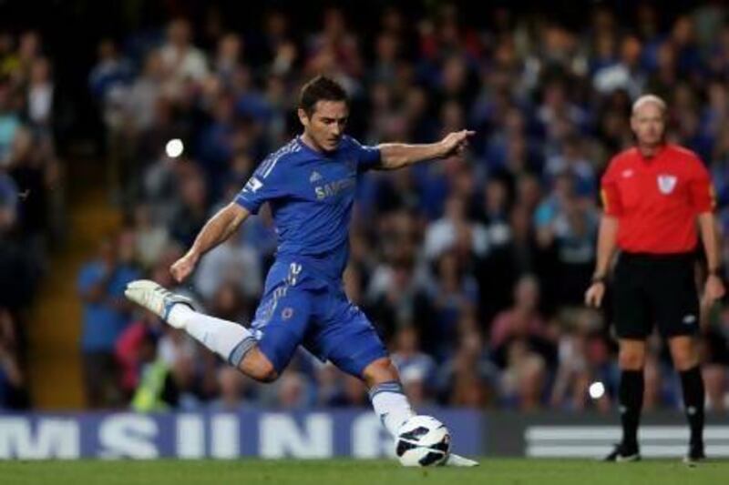 LONDON, ENGLAND - AUGUST 22: Frank Lampard of Chelsea scores the opening goal from the penalty spot during the Barclays Premier League match between Chelsea and Reading at Stamford Bridge on August 22, 2012 in London, England. (Photo by Mark Thompson/Getty Images)