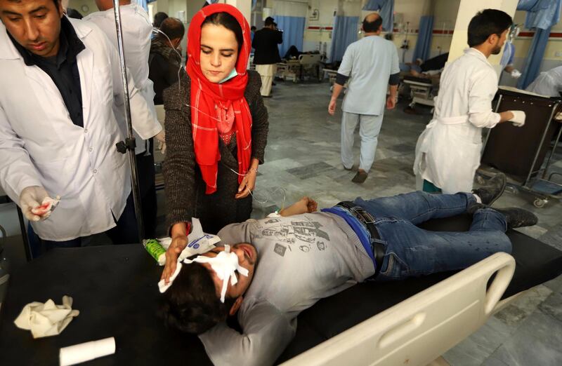 An Afghan boy who was injured in a bomb explosion receives medical treatment at a hospital in Kabul. Jawad Jalali / EPA
