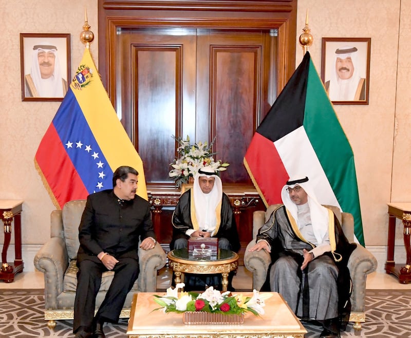 Venezuela's President Nicolas Maduro, left, speaks with Kuwait's Minister of State for Cabinet Affairs, Sheikh Mohammad Abdullah Al Sabah, in Kuwait City.  Photo: Kuwaiti Emiri Diwan