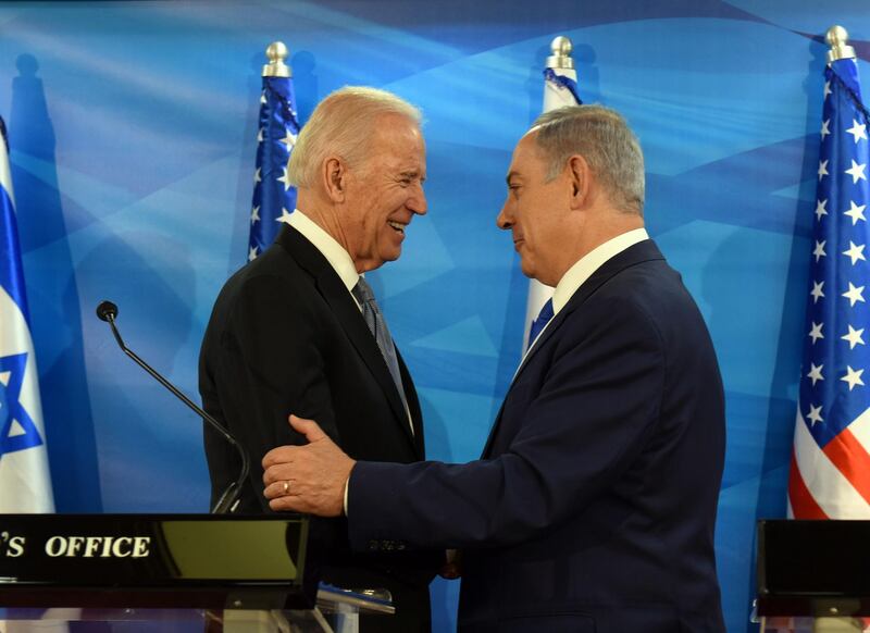 (FILES) In this file photo taken on March 09, 2016, US Vice President Joe Biden and Israeli Prime Minister Benjamin Netanyahu shake hands while giving joint statements at the prime minister's office in Jerusalem.   President Joe Biden will talk "soon" with Israeli Prime Minister Benjamin Netanyahu but has no "specific" plan to do so yet, the White House said on February 11, 2021, underlining an apparent distancing in the key relationship.

 / AFP / POOL / DEBBIE HILL
