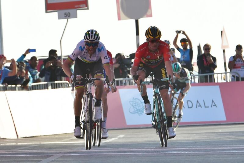 Spain's Alejandro Valverde of Movistar (L) crosses to win ahead of Primoz Roglic of Tam Jumbo - Visma the third stage of the UAE cycling tour in Al Ain on February 26, 2019. / AFP / GIUSEPPE CACACE
