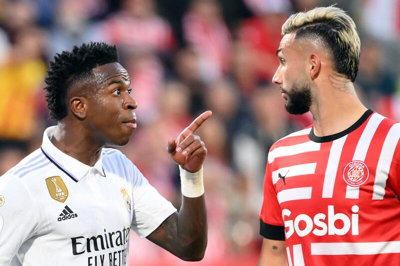 Real Madrid's Vinicius Junior remonstrates with Girona's Taty Castellanos during the La Liga match at the Montilivi stadium in Girona on April 25, 2023. Girona won the match 4-2, with Castellanos bagging all four Girona goals. AFP