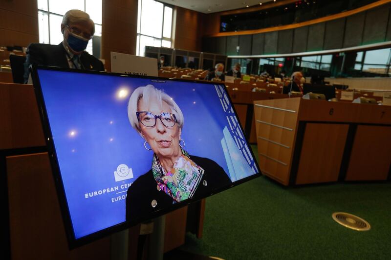 epa09081131 Christine Lagarde, President of the European Central Bank, shown on screen as she takes part in a monetary dialogue by a videoconference during a Committee on Economic and Monetary Affairs at the European Parliament in Brussels, Belgium, 18 March 2021.  EPA/STEPHANIE LECOCQ Committee on Economic and Monetary Affairs